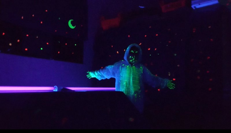 We use Uv lights And neon paint to represent the space