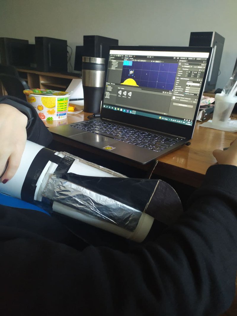 A programmer loves team leader's rocket so much that coding while hugging it XD